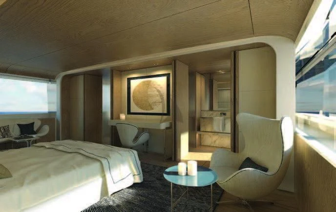 a room with a bed and a table and chairs aboard KOJU Yacht for Sale