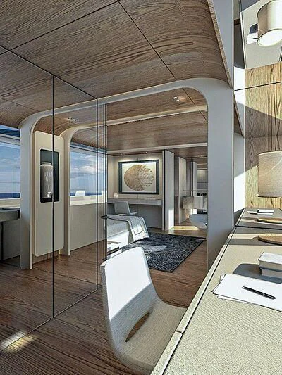 a room with a bed and a desk aboard KOJU Yacht for Sale