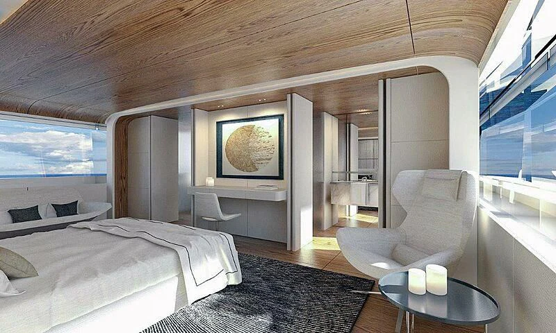 a room with a bed and a television aboard KOJU Yacht for Sale
