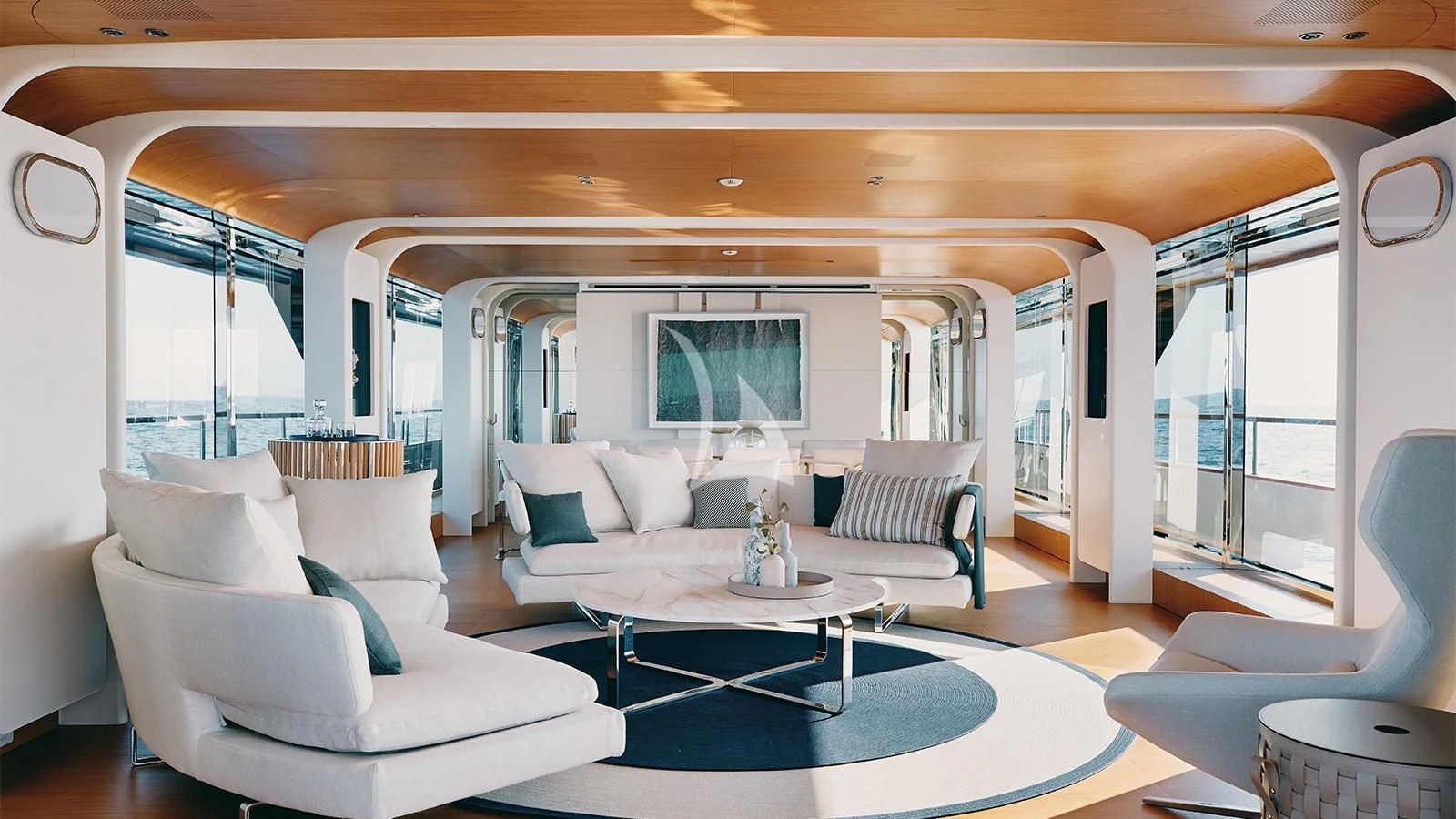 a living room with a large window aboard KOJU Yacht for Sale