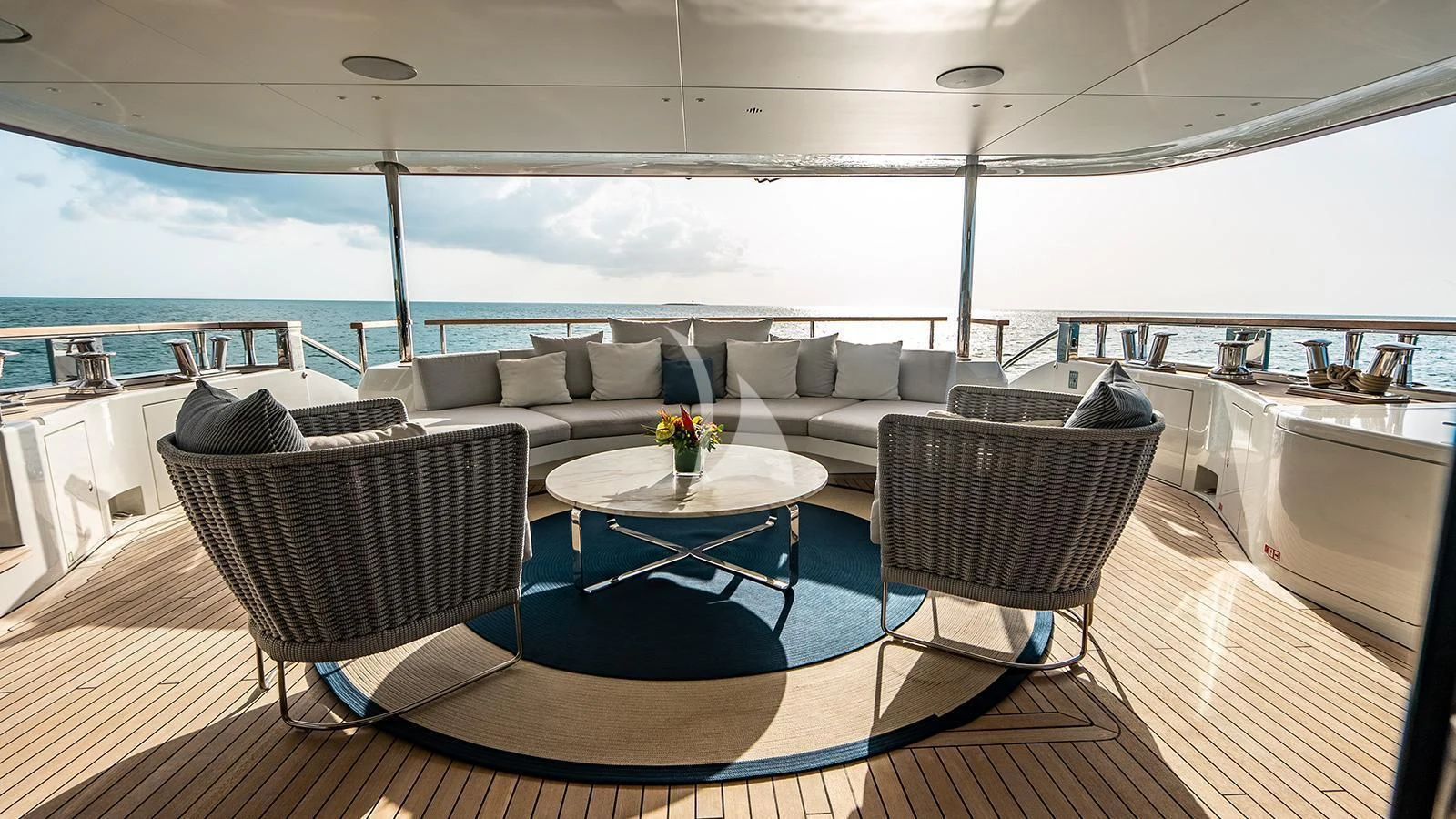a living room with a large window aboard KOJU Yacht for Sale