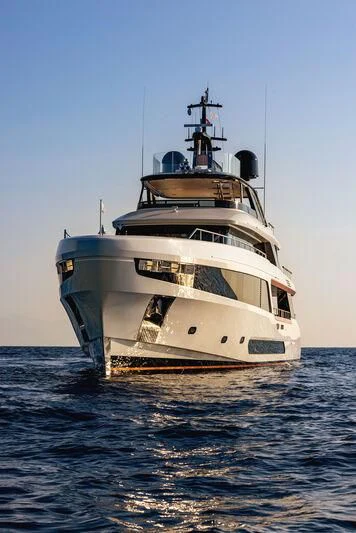 a large white boat in the water aboard KOJU Yacht for Sale