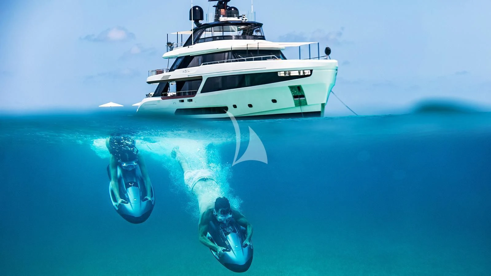 a person swimming in the water aboard KOJU Yacht for Sale