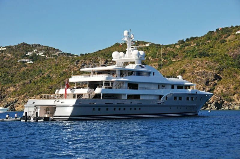 a large white boat on the water aboard KOJU Yacht for Sale