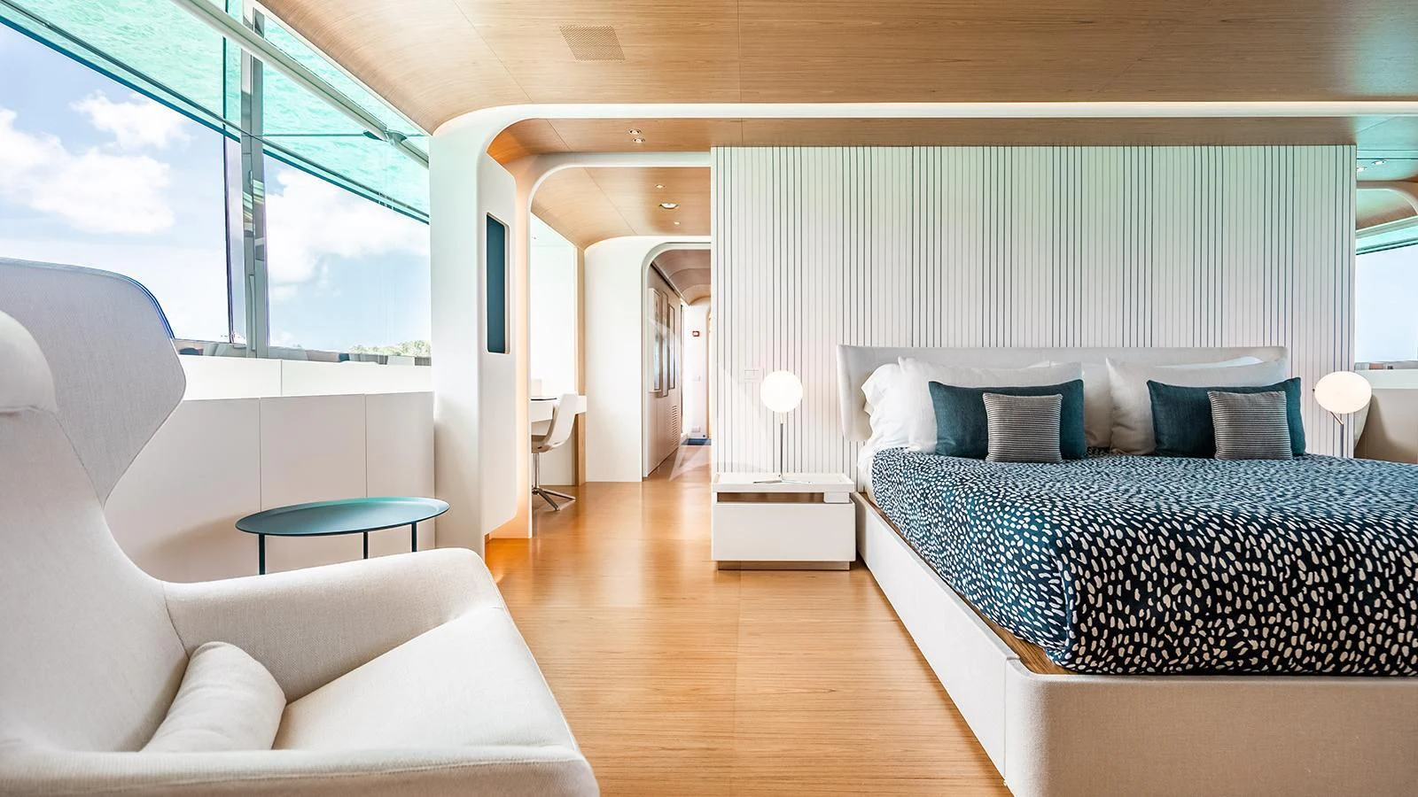 a room with a bed and a couch aboard KOJU Yacht for Sale