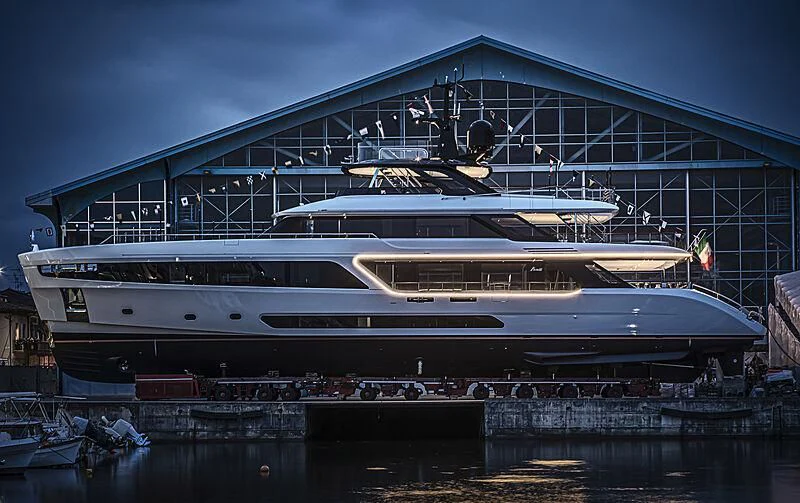 a large cruise ship docked aboard KOJU Yacht for Sale