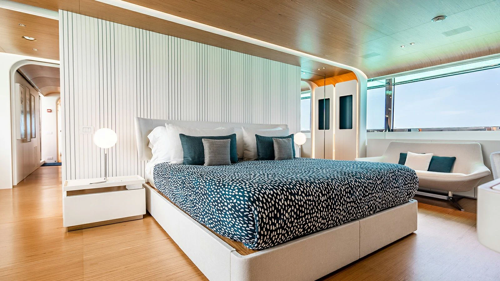 a large bedroom with a bed aboard KOJU Yacht for Sale