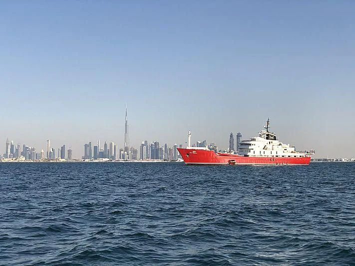 a large ship in the water aboard KOJU Yacht for Sale