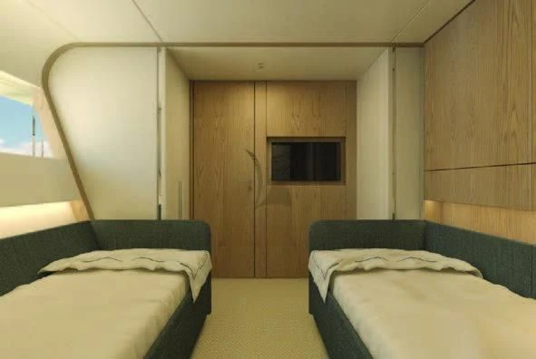 a room with two beds aboard KOJU Yacht for Sale