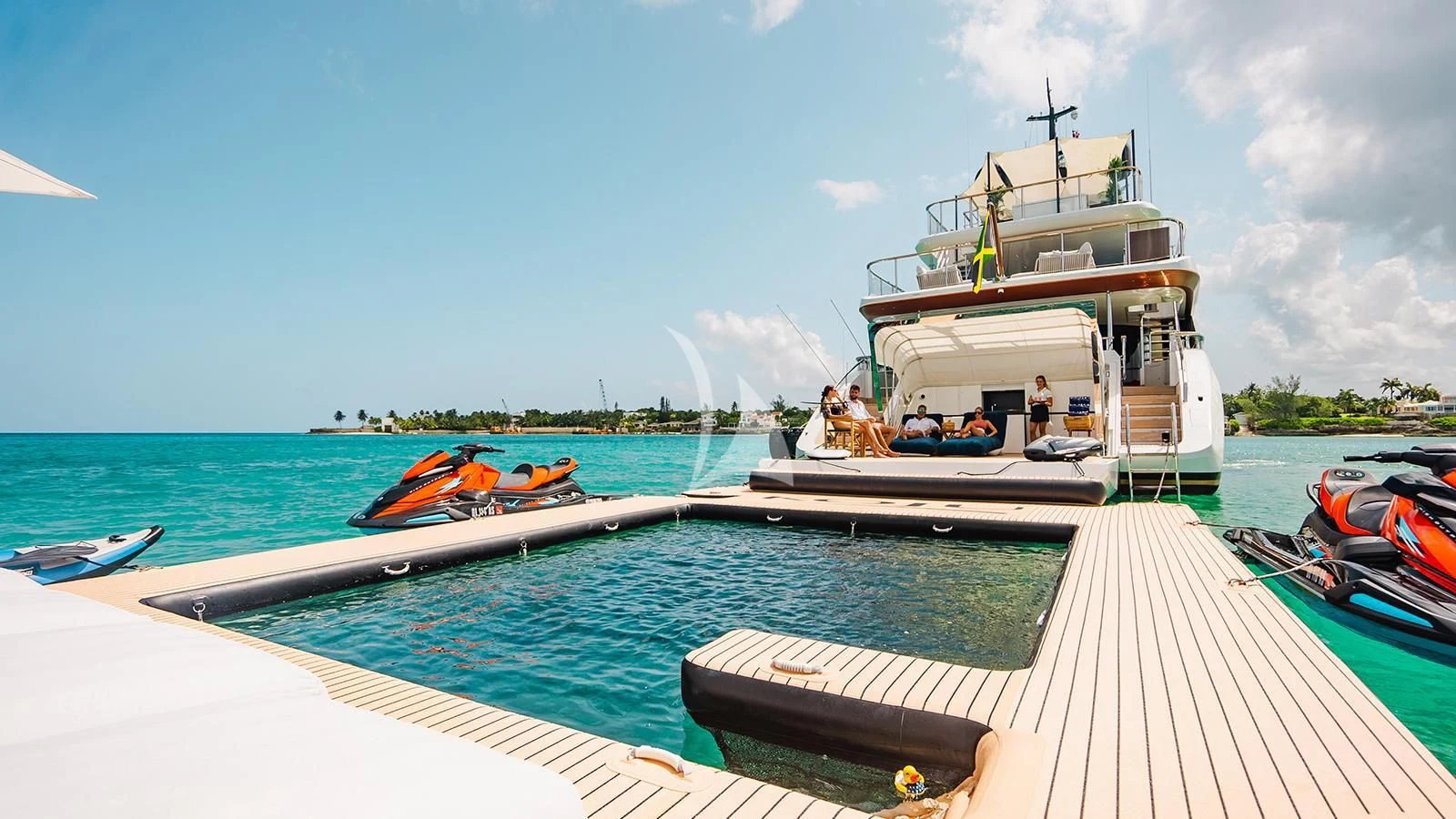 a boat docked at a pier aboard KOJU Yacht for Sale