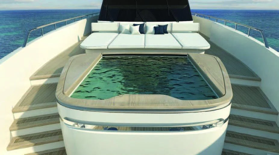 a white boat on a body of water aboard KOJU Yacht for Sale