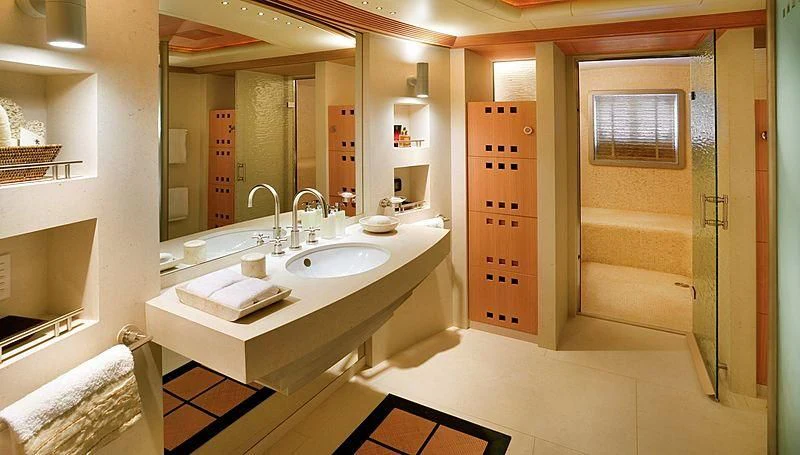 a bathroom with a sink and a mirror aboard KOJU Yacht for Sale