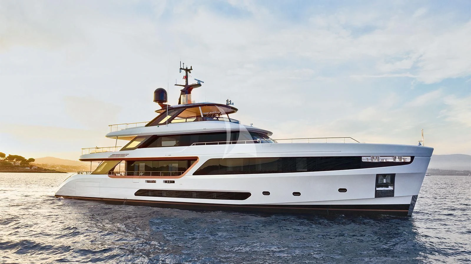 a white yacht on the water aboard KOJU Yacht for Sale