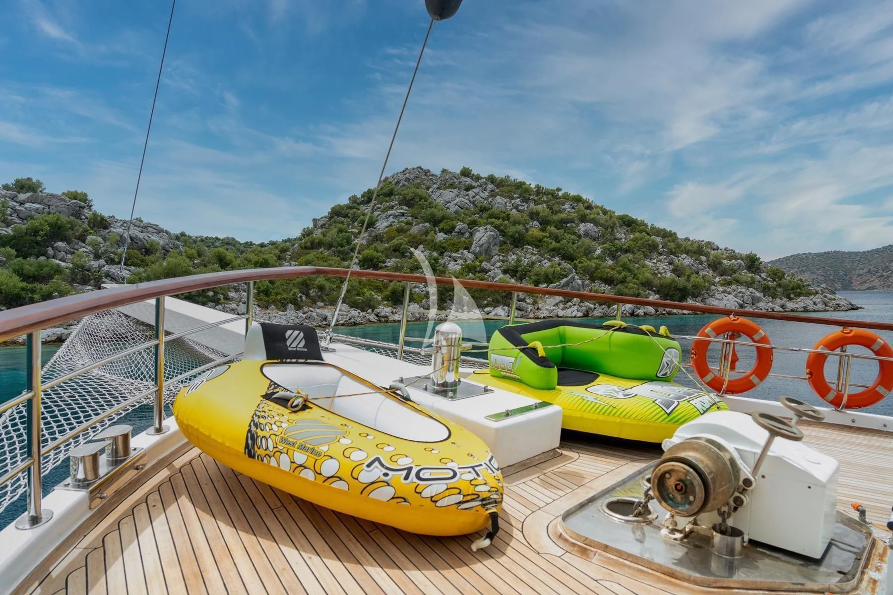a yellow and black toy boat aboard QUESTA VITA Yacht for Sale