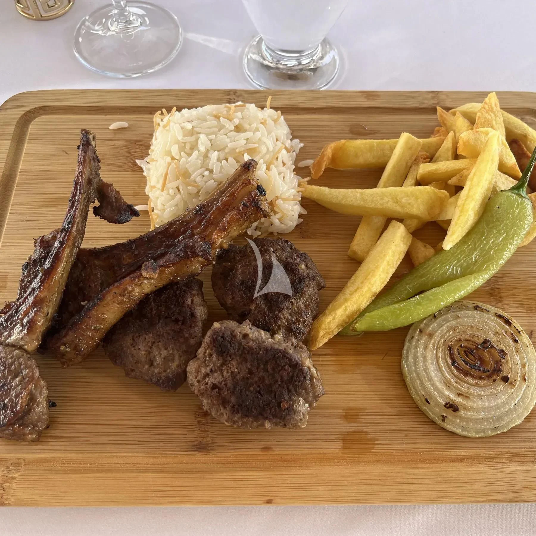 a plate of food aboard QUESTA VITA Yacht for Sale