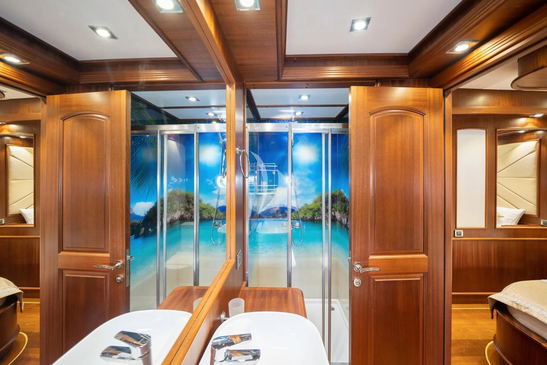 a room with a table and chairs aboard QUESTA VITA Yacht for Sale