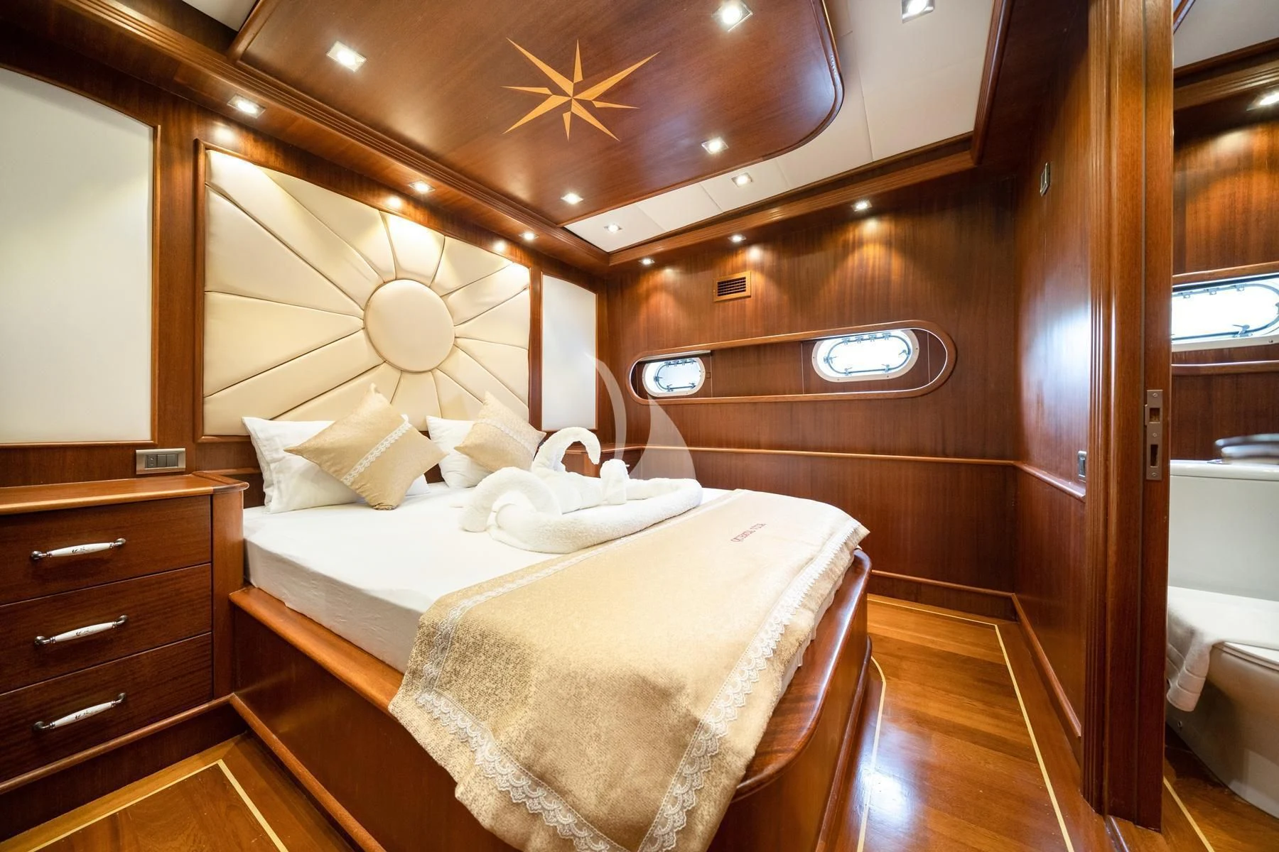a room with two beds aboard QUESTA VITA Yacht for Sale