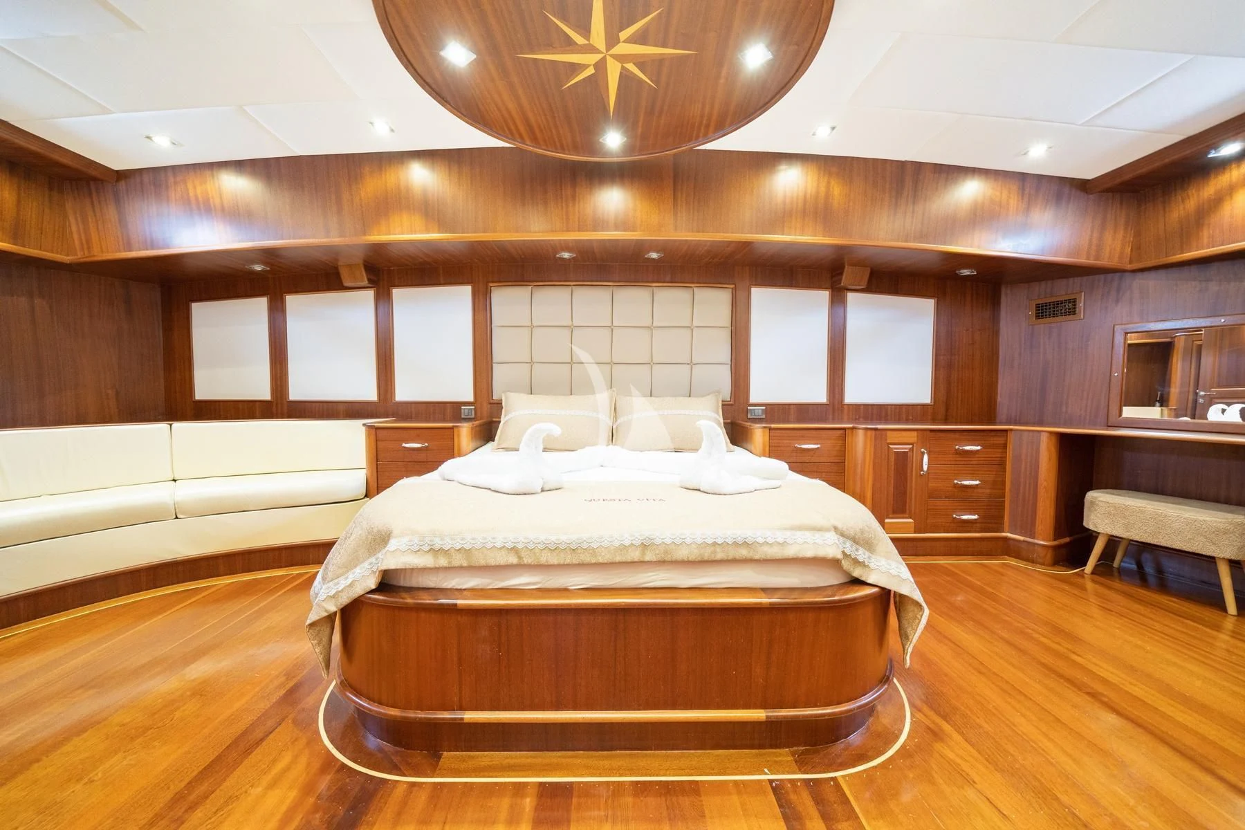 a large room with a bed aboard QUESTA VITA Yacht for Sale