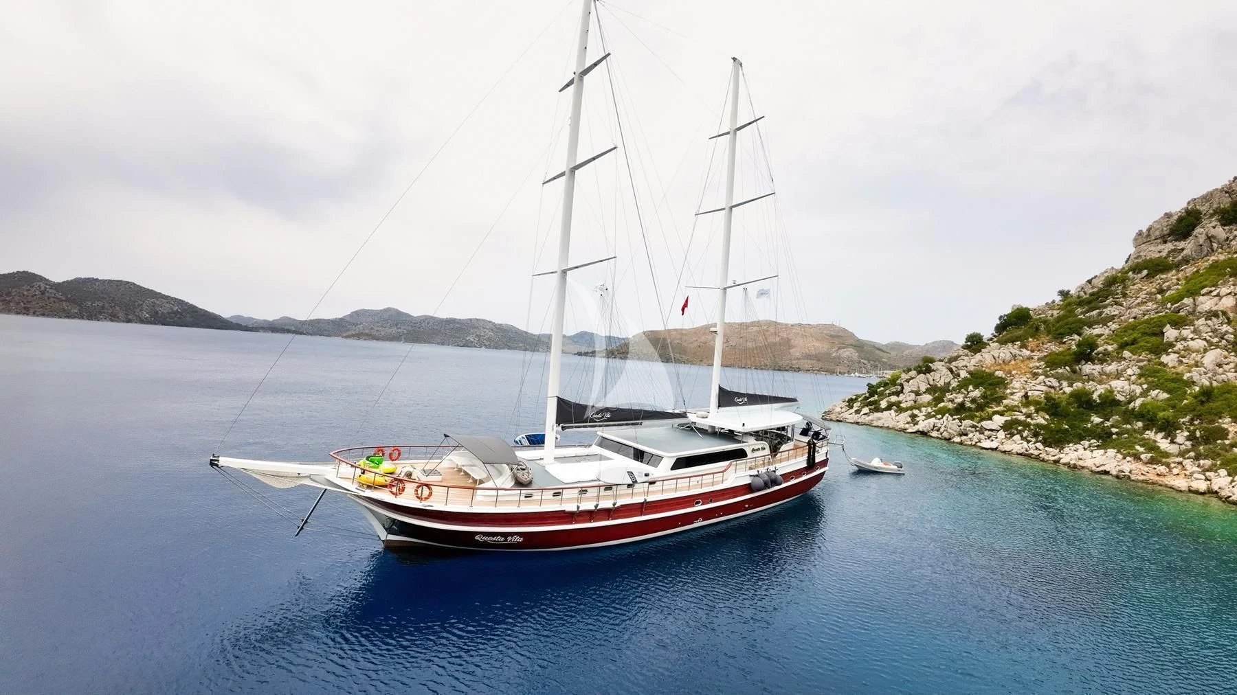 a boat on the water aboard QUESTA VITA Yacht for Sale