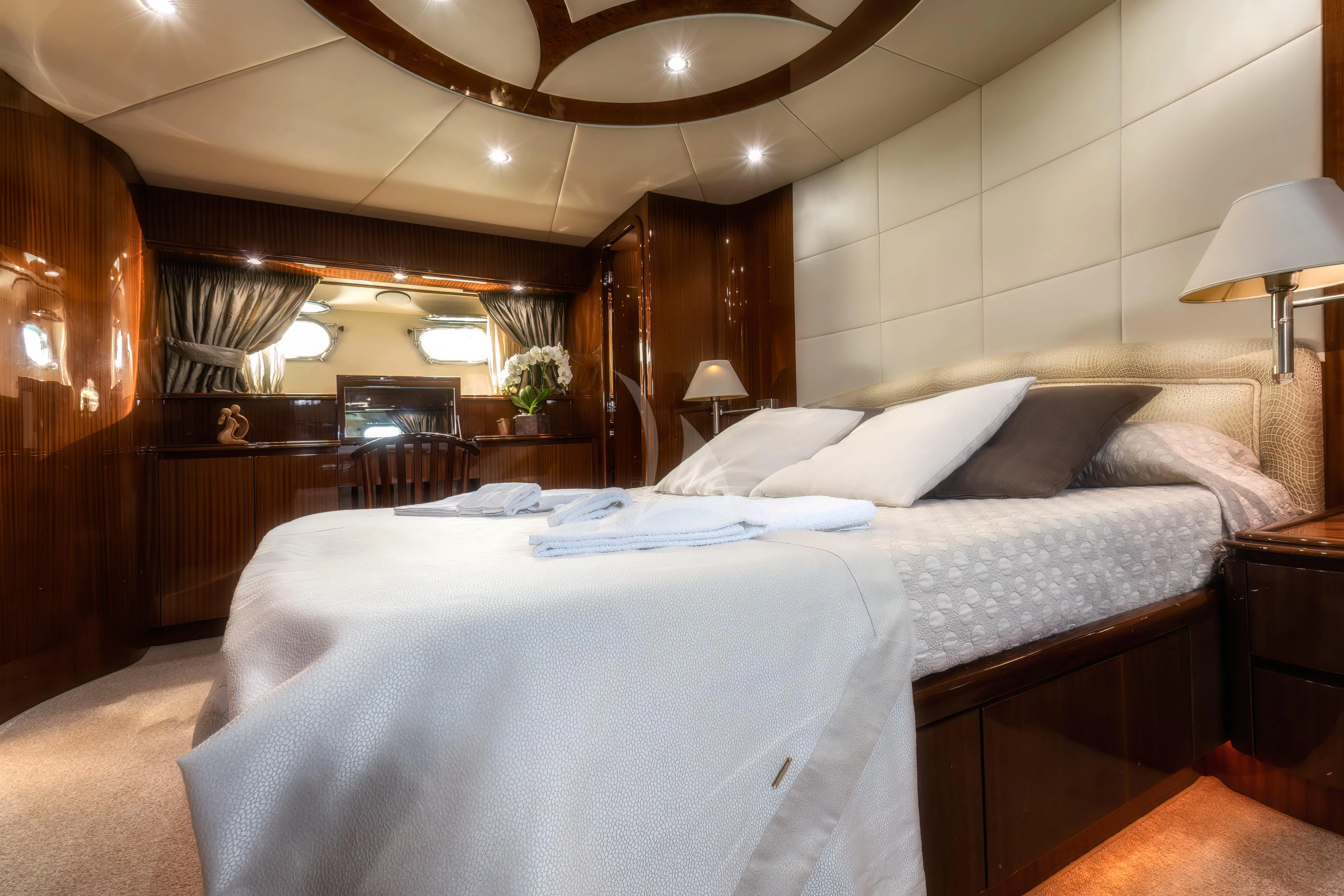 a couple of beds in a room aboard JAUNI Yacht for Sale
