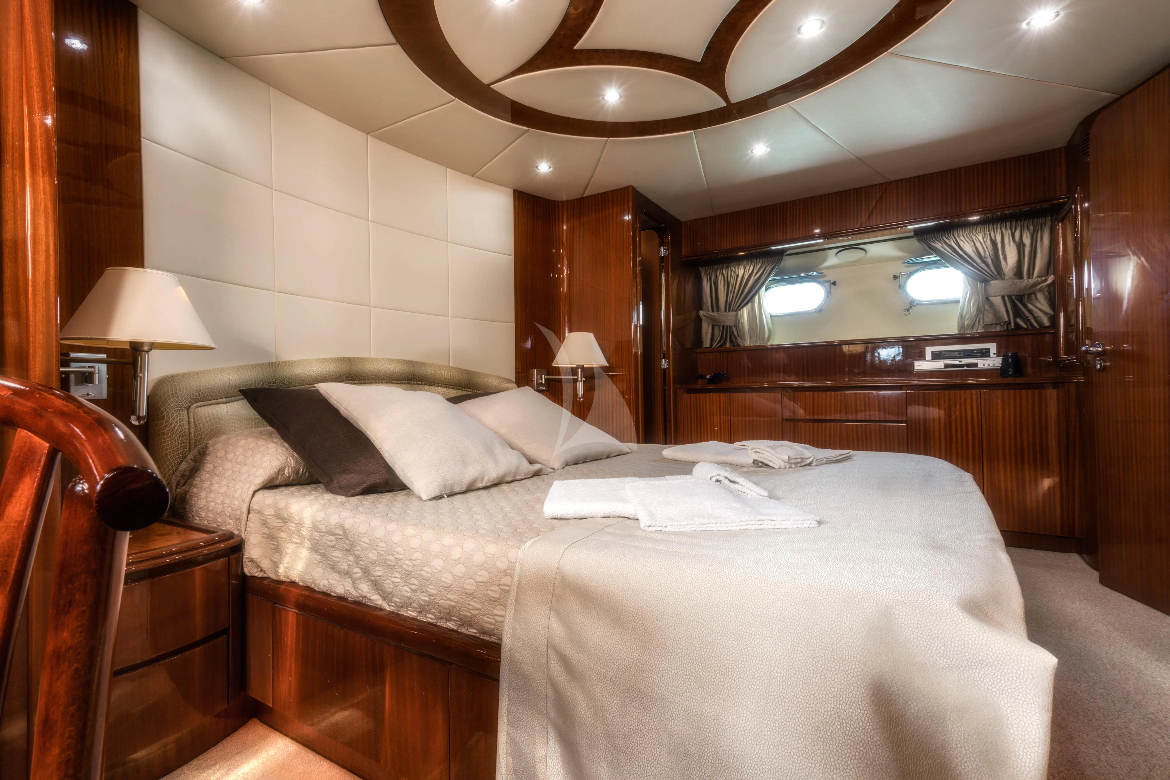 a couple of beds in a hotel room aboard JAUNI Yacht for Sale