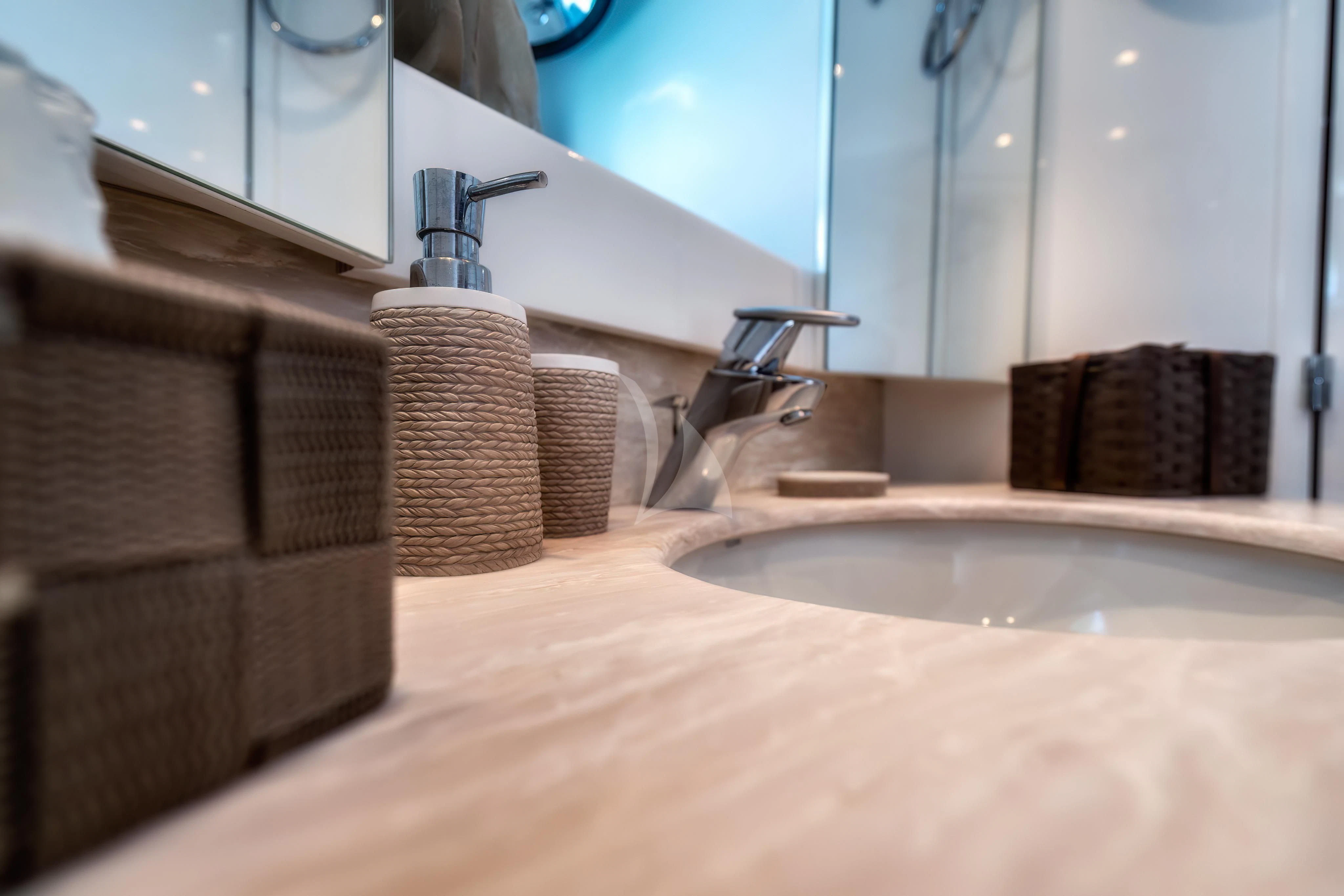 a bathroom with towels and a sink aboard JAUNI Yacht for Sale