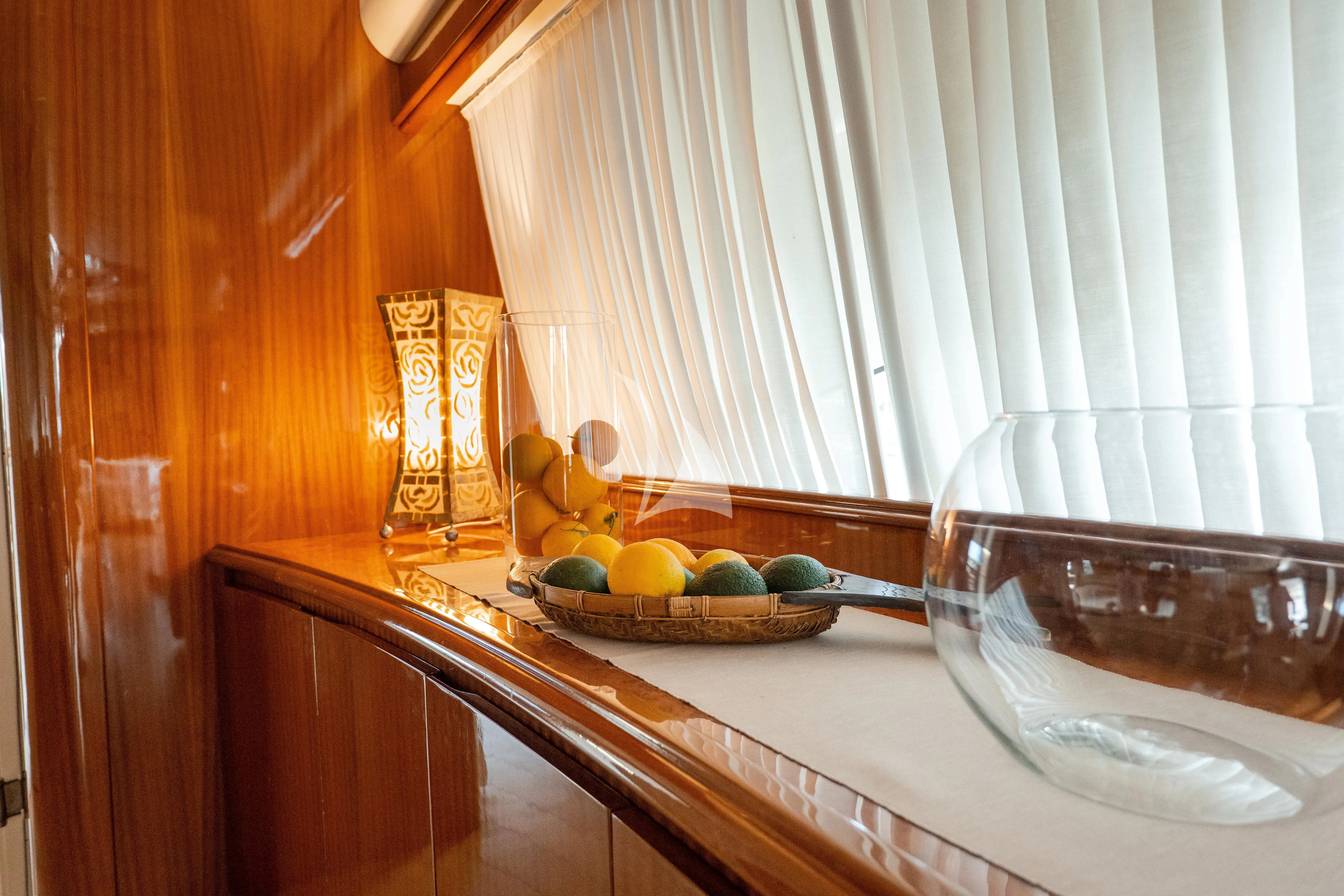 a bowl of fruit on a counter aboard JAUNI Yacht for Sale