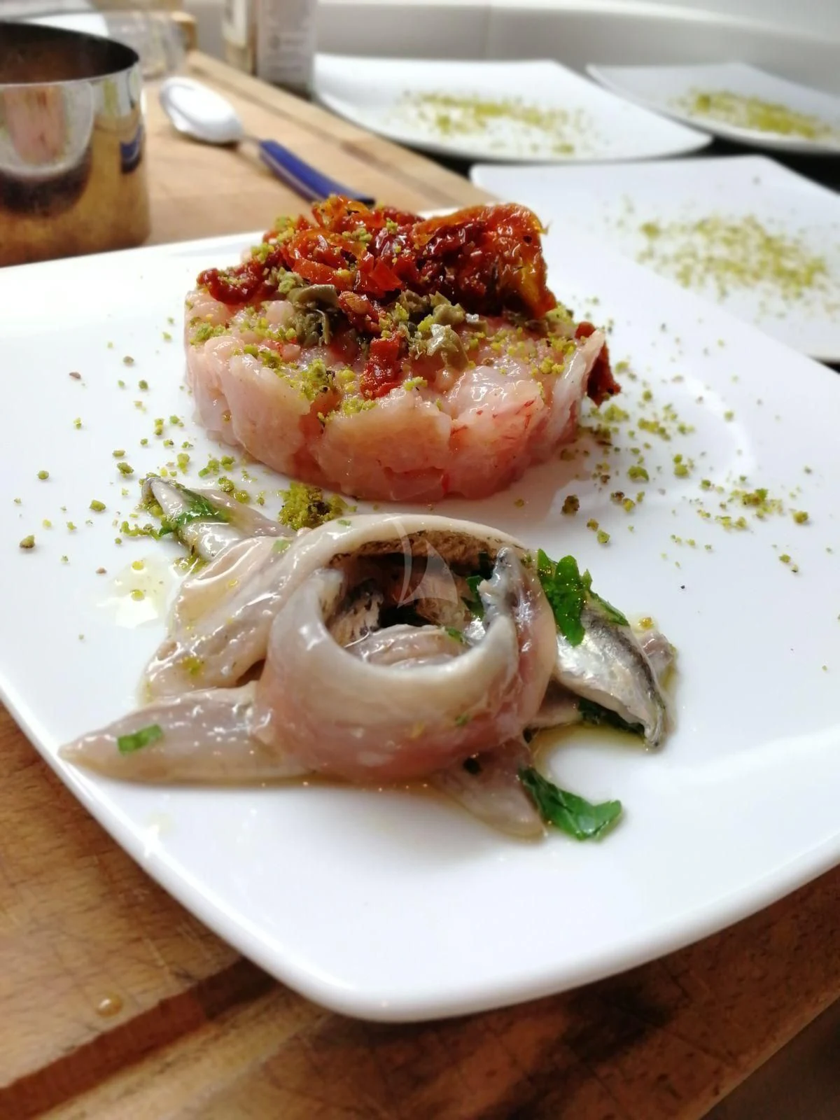 a plate of food aboard JAUNI Yacht for Sale