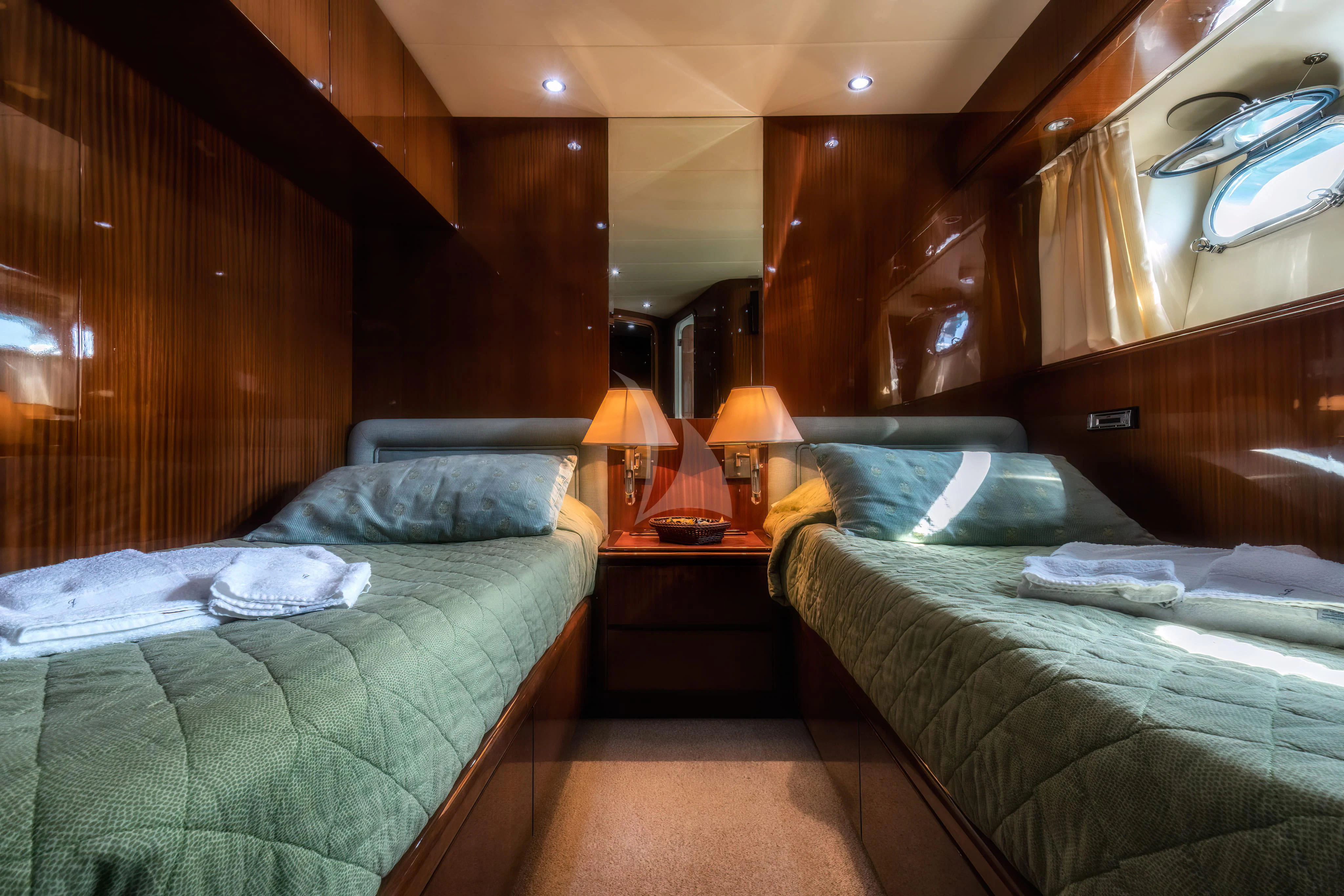 a couple of beds in a cabin aboard JAUNI Yacht for Sale