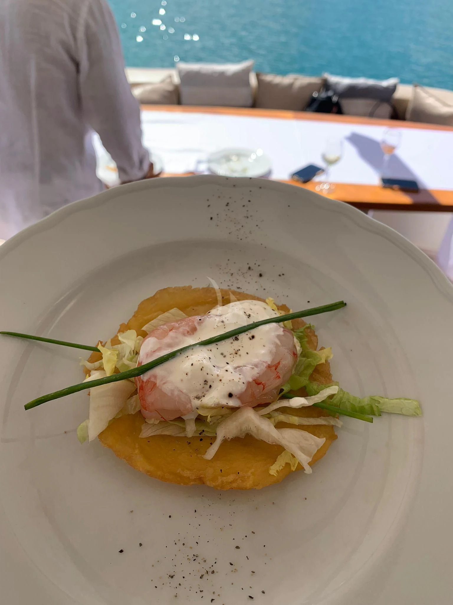 a sandwich on a plate aboard JAUNI Yacht for Sale