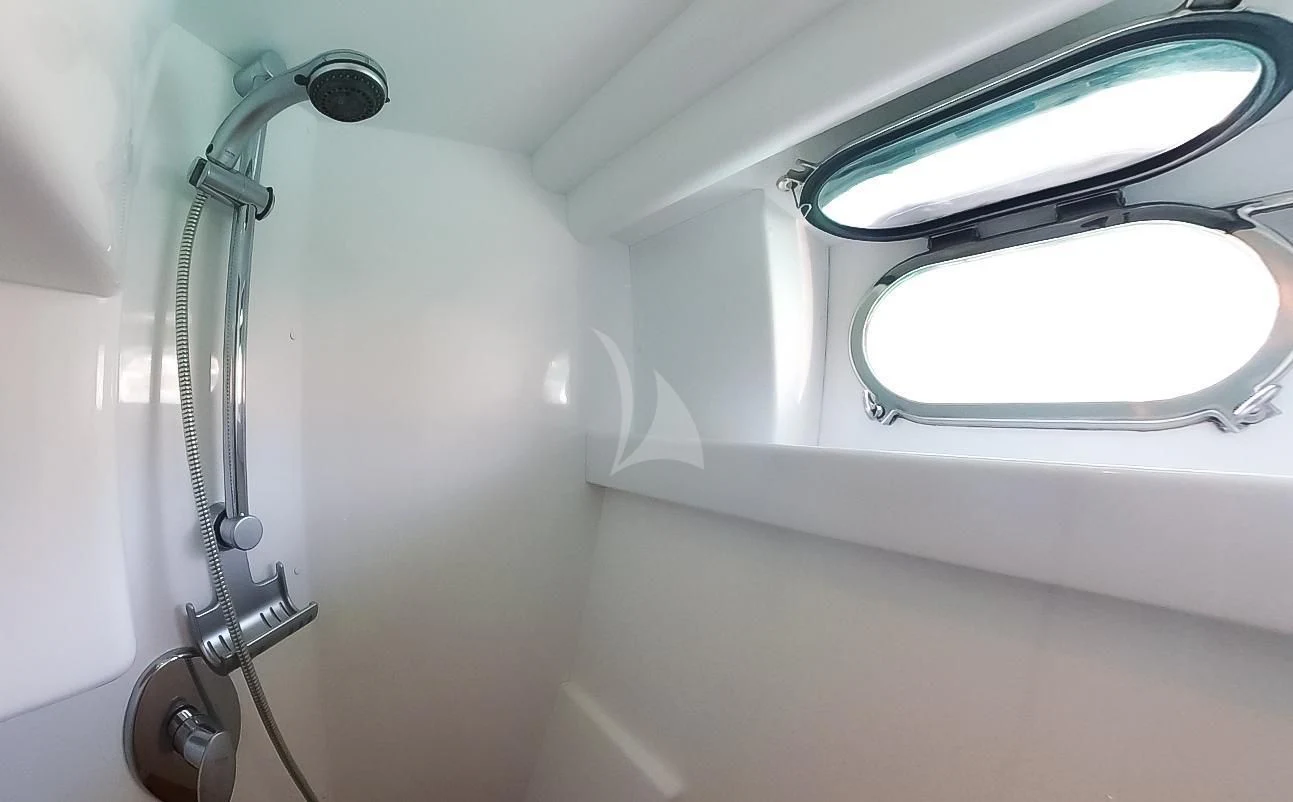 a shower with a glass door aboard JAUNI Yacht for Sale