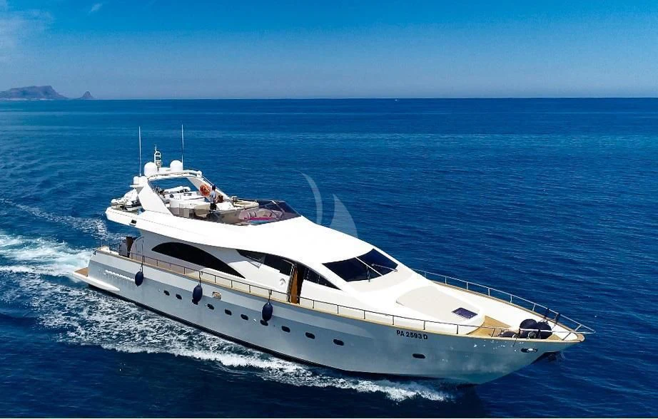 a white yacht on the water aboard JAUNI Yacht for Sale
