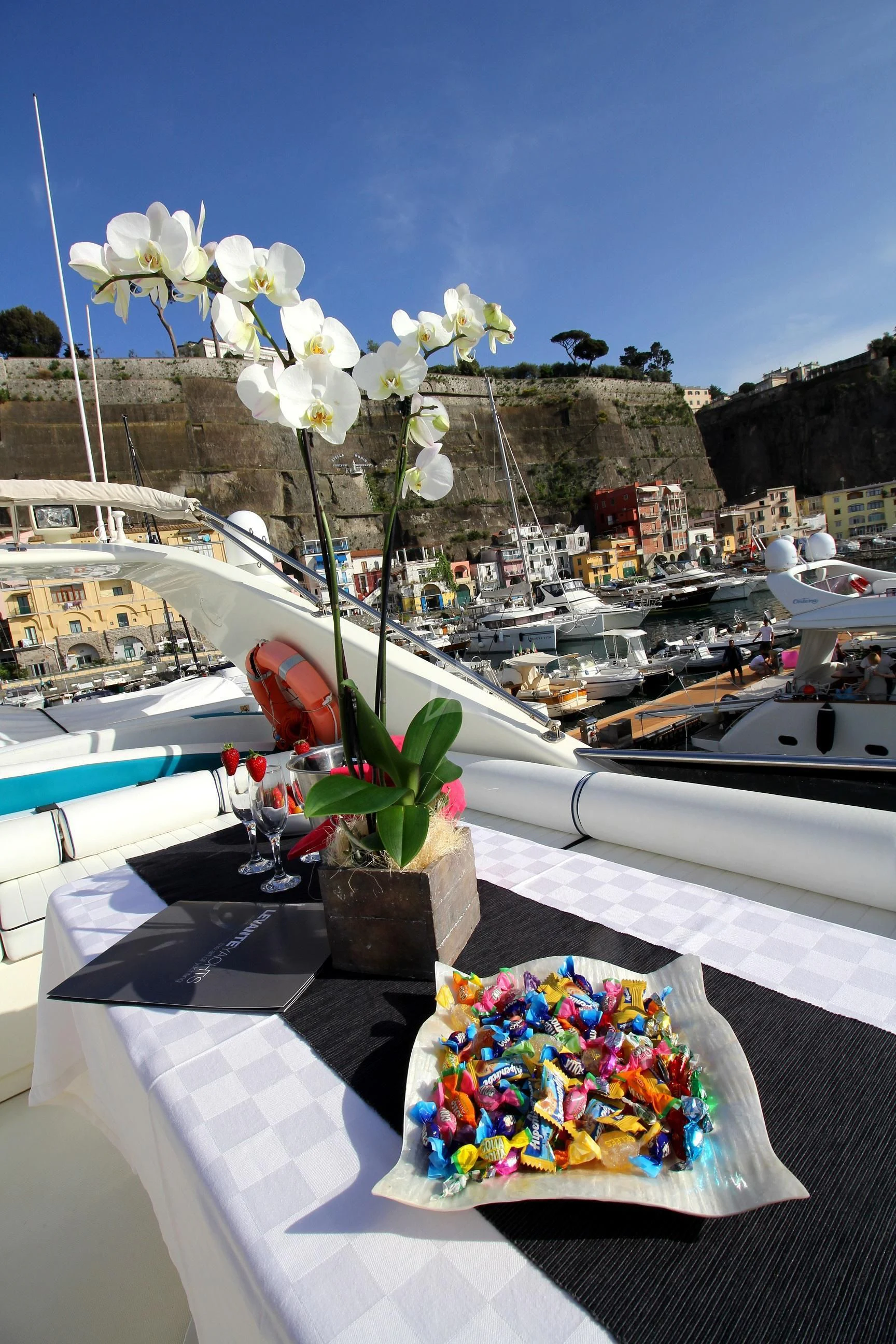 a flower on a table aboard JAUNI Yacht for Sale