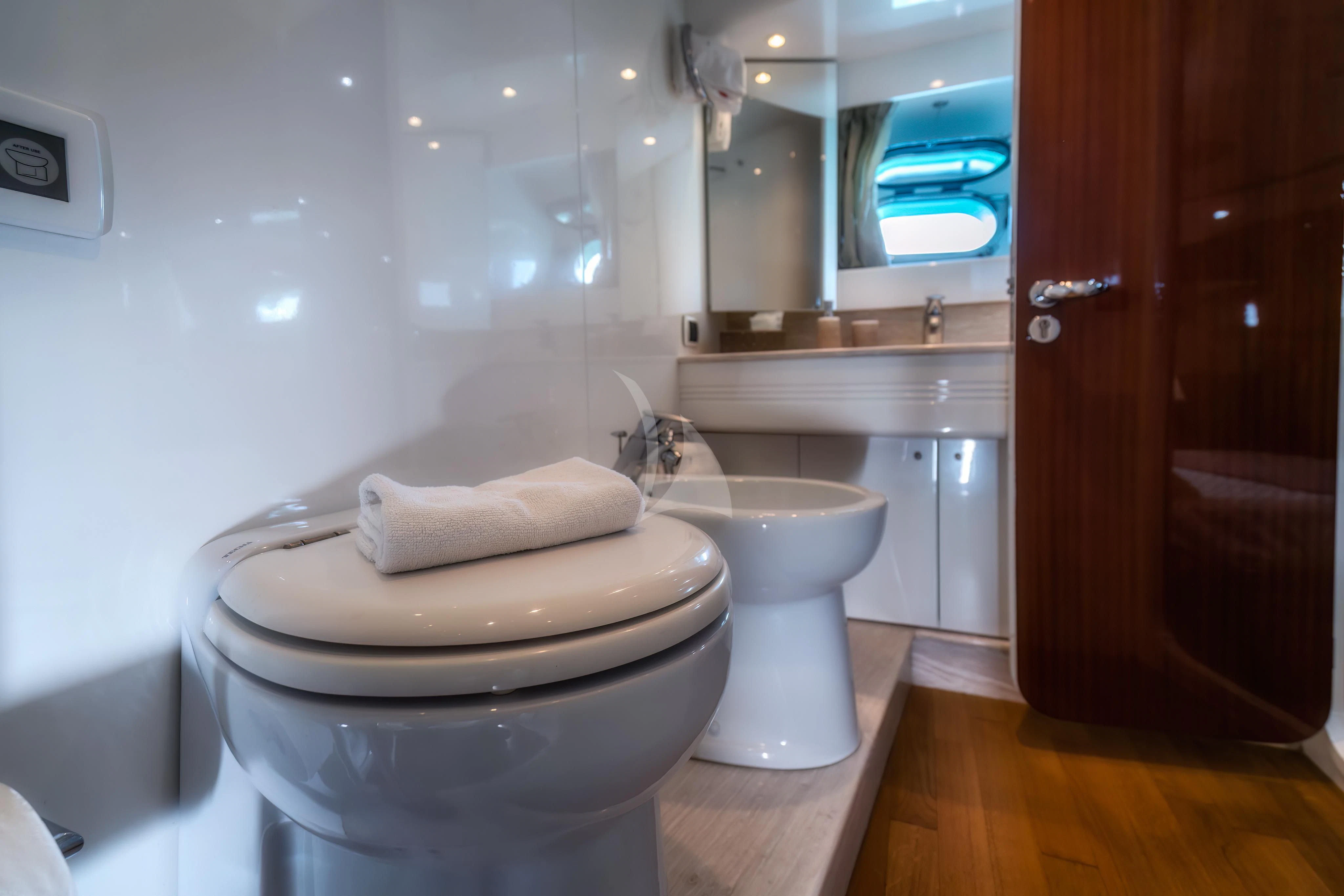 a bathroom with a toilet and sink aboard JAUNI Yacht for Sale