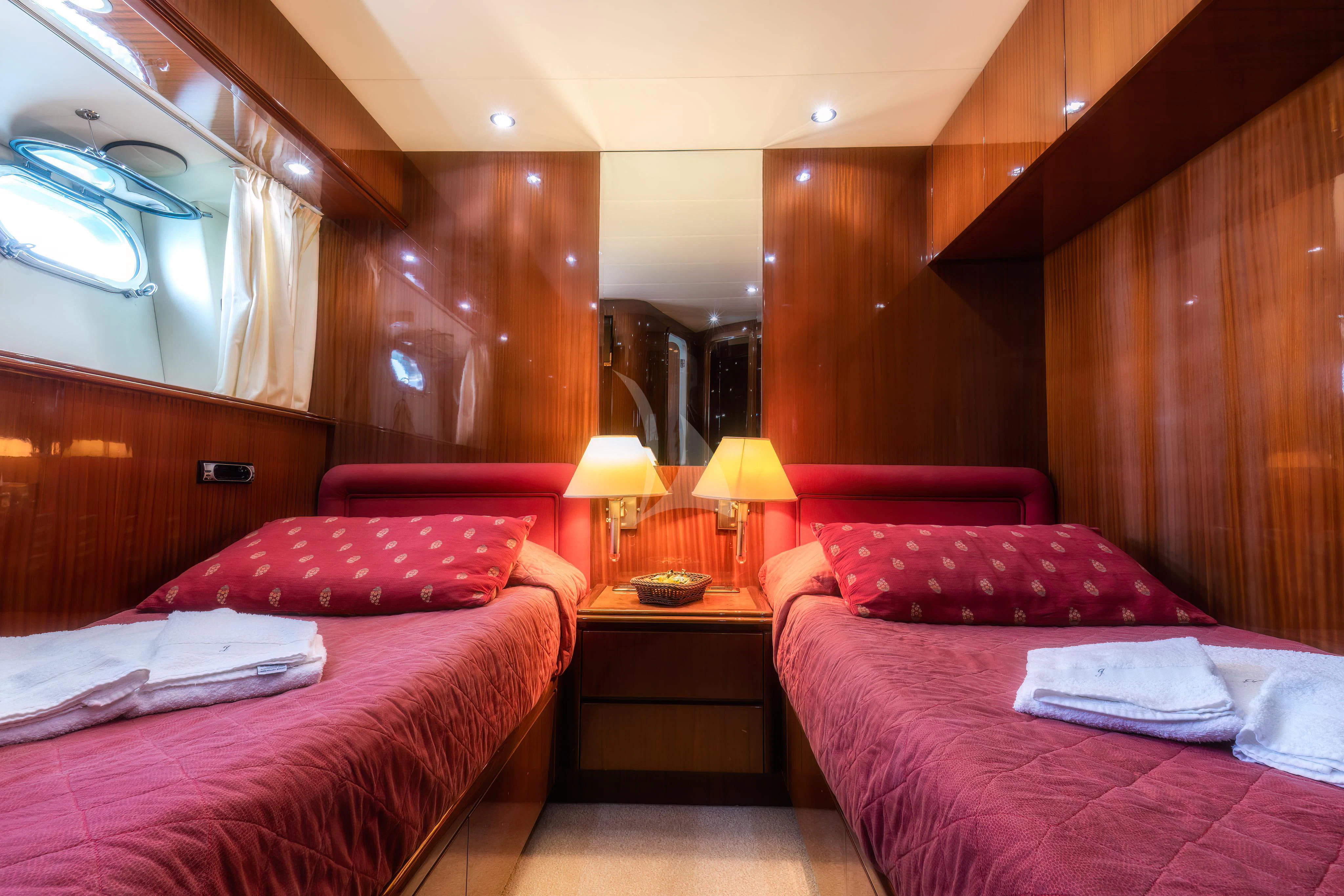 a couple of beds in a room aboard JAUNI Yacht for Sale