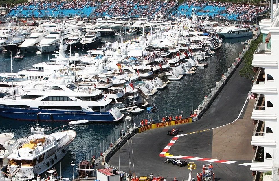 boats docked at a pier aboard JAUNI Yacht for Sale