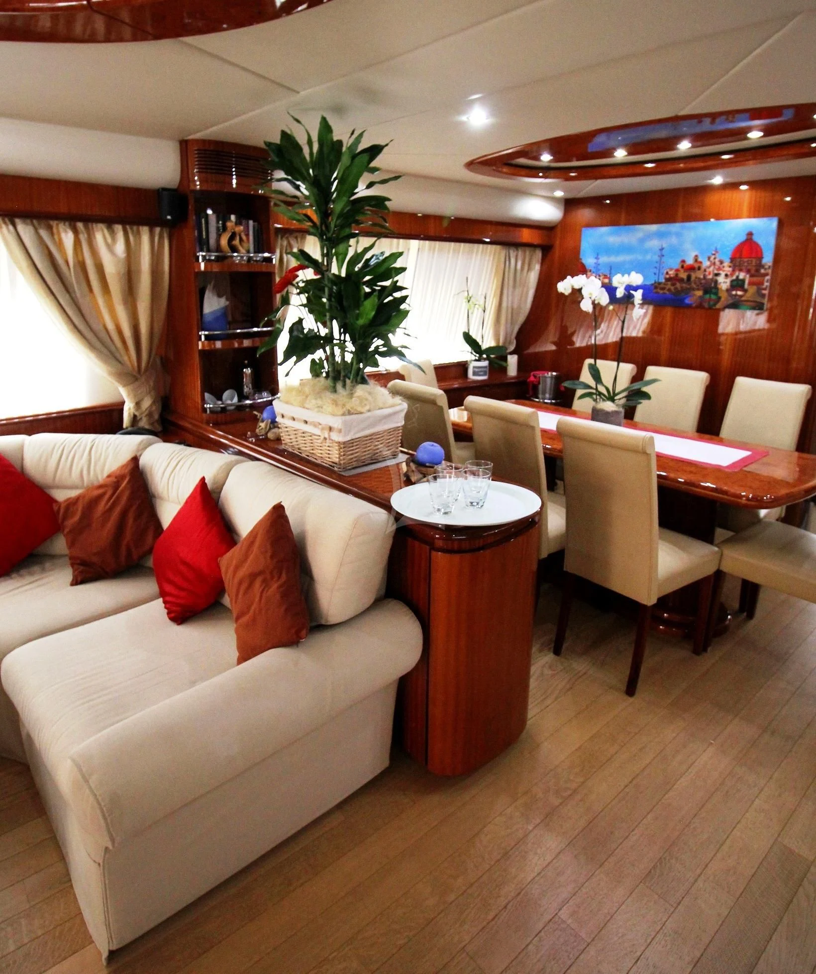 a living room with a couch and a table aboard JAUNI Yacht for Sale