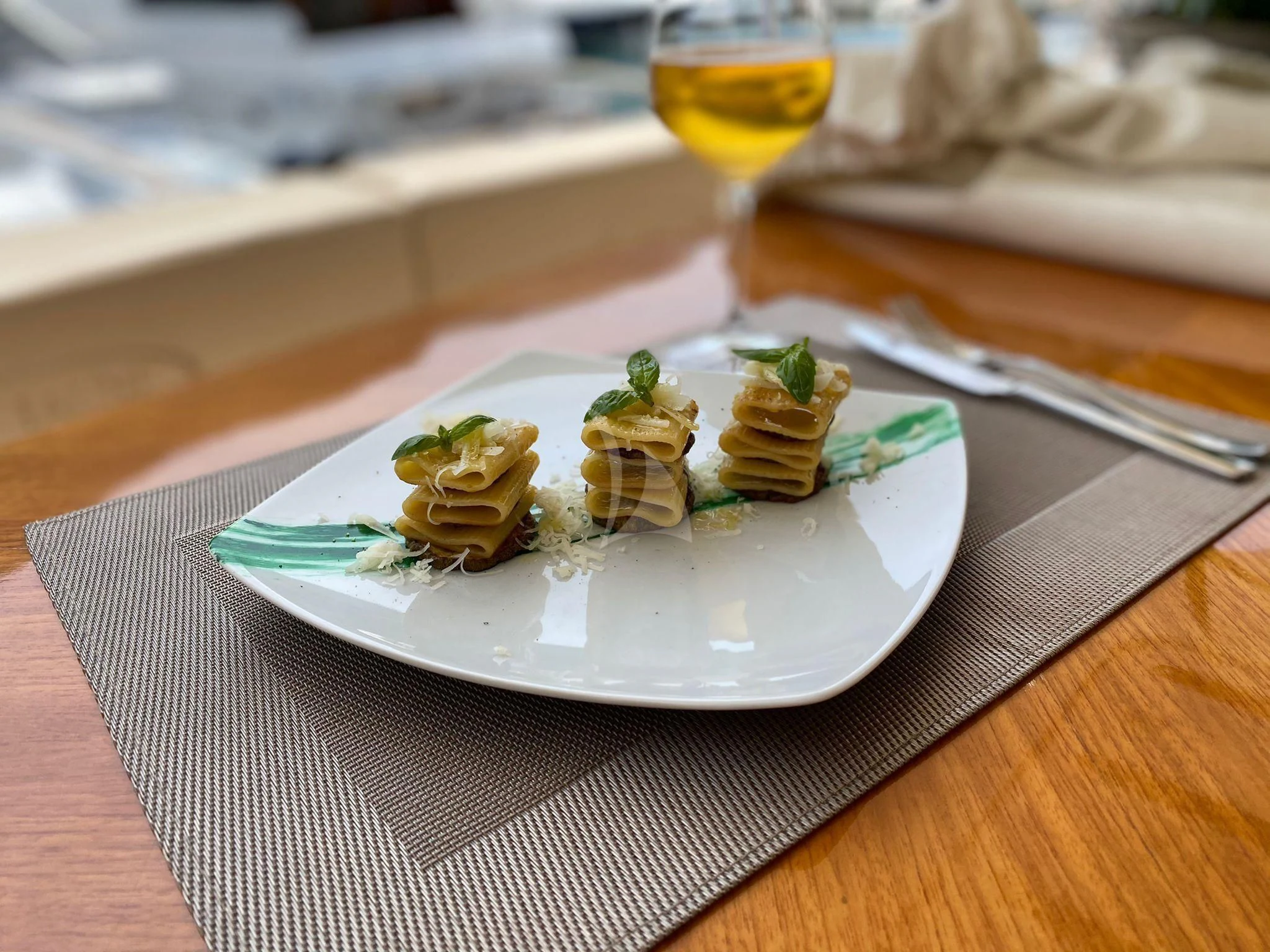 a plate of food aboard JAUNI Yacht for Sale