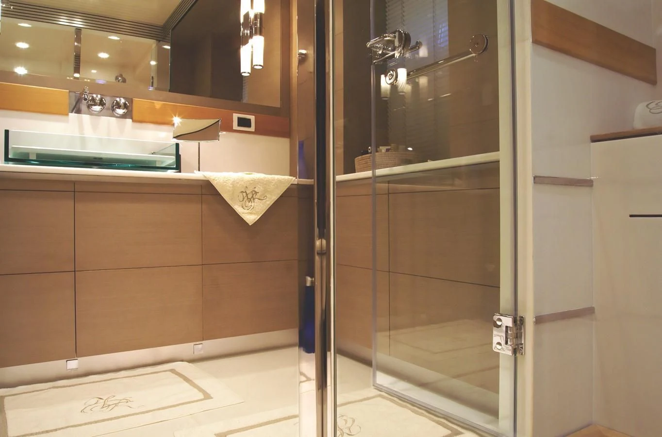 a bathroom with glass doors aboard RL NOOR Yacht for Sale