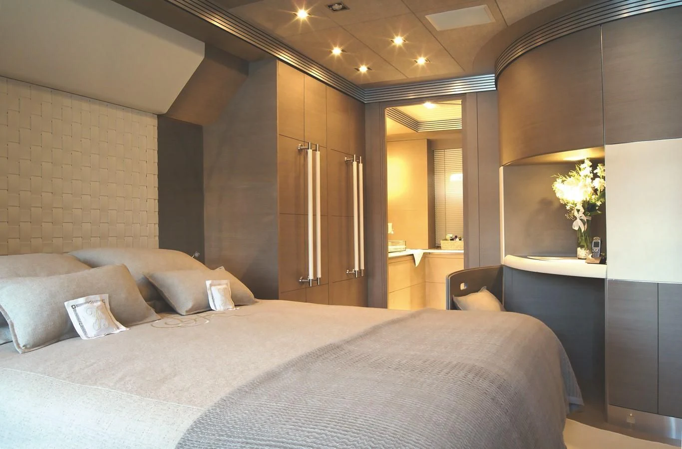 a bed in a room aboard RL NOOR Yacht for Sale