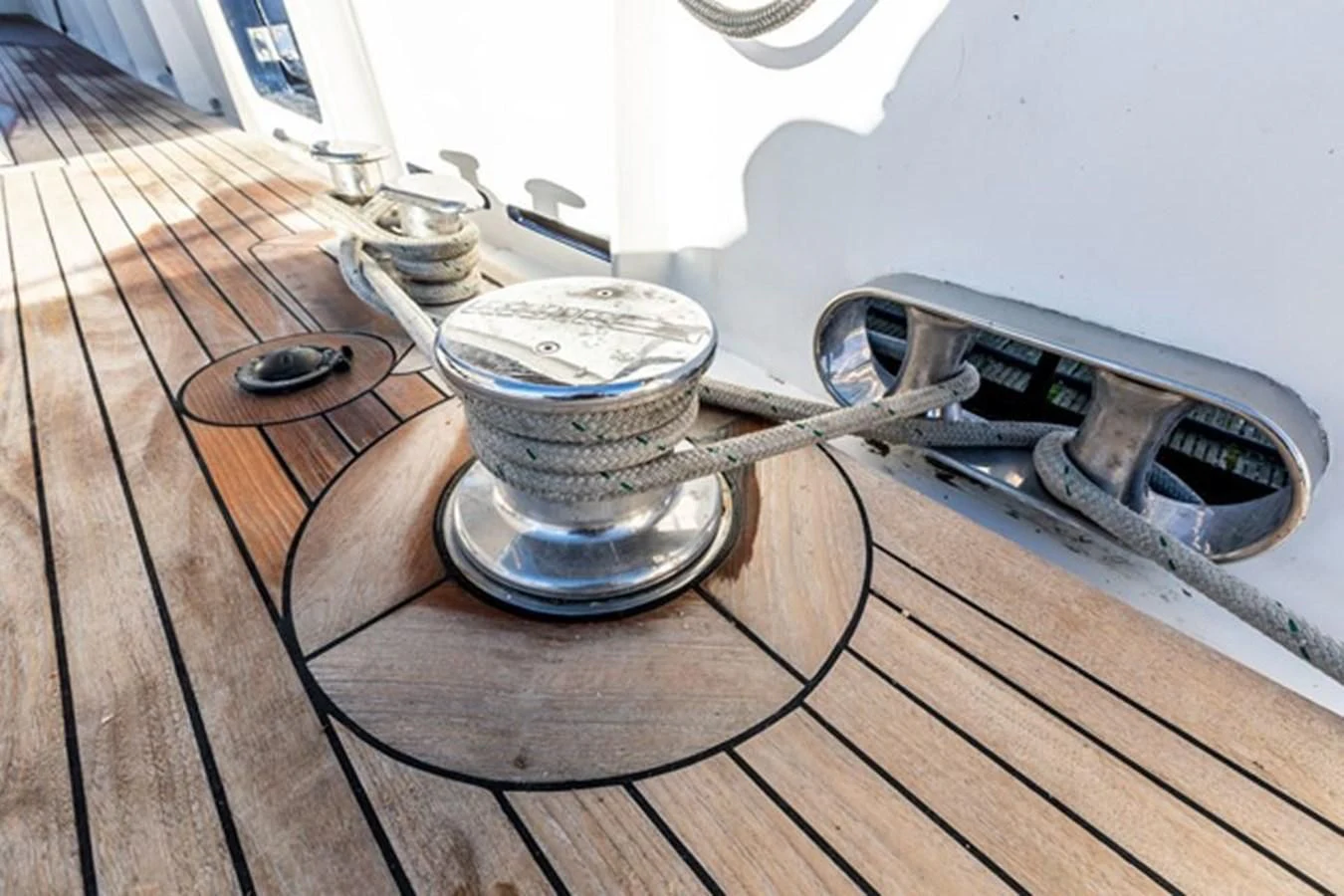 a group of metal objects on a wooden surface aboard HISTORY Yacht for Sale