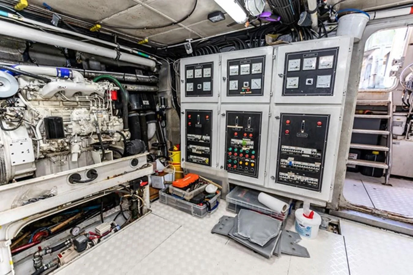 a room with a computer and equipment aboard HISTORY Yacht for Sale