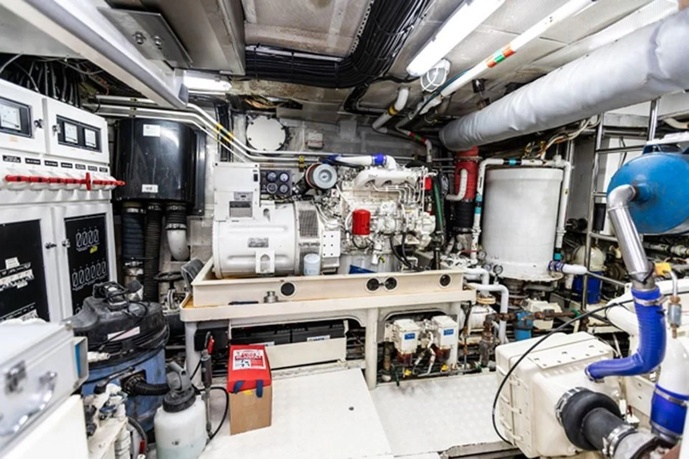 a room with machinery and pipes aboard HISTORY Yacht for Sale