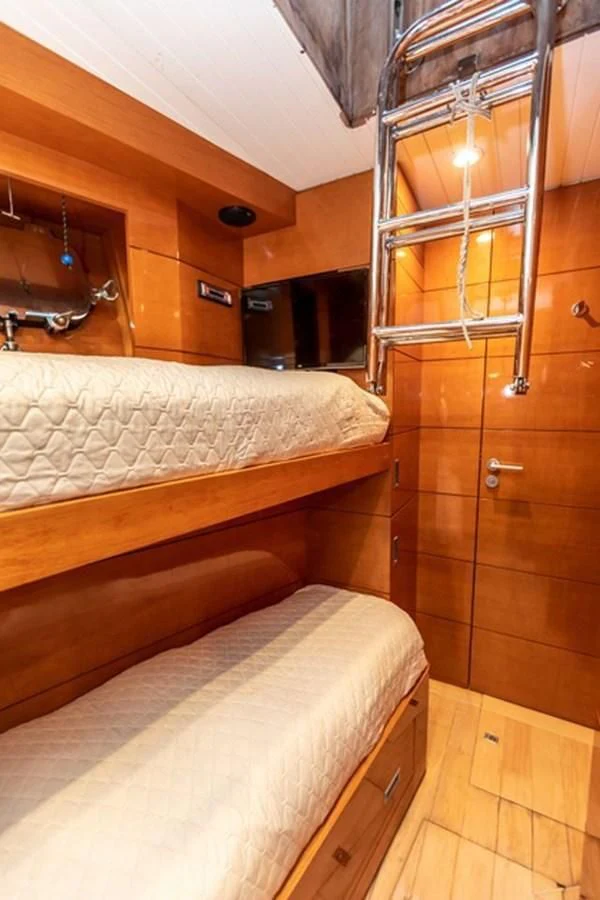 a bunk bed in a cabin aboard HISTORY Yacht for Sale