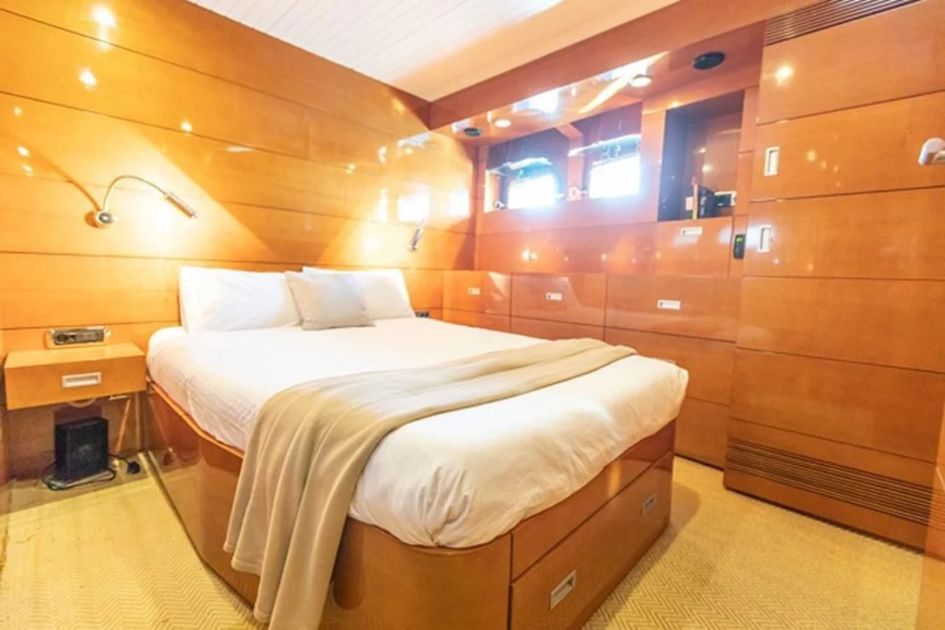 a bed in a room aboard HISTORY Yacht for Sale