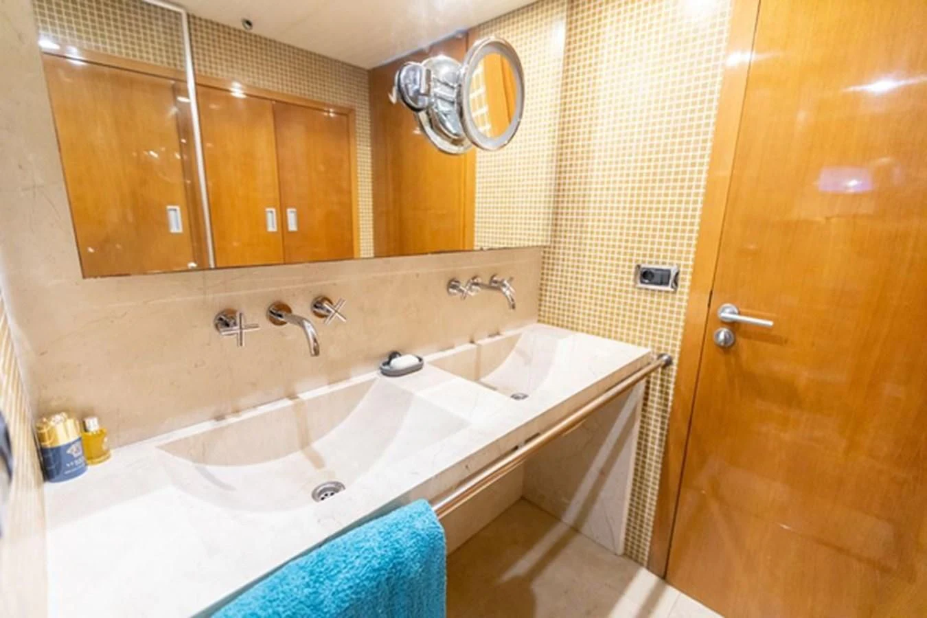 a bathroom with a large mirror aboard HISTORY Yacht for Sale