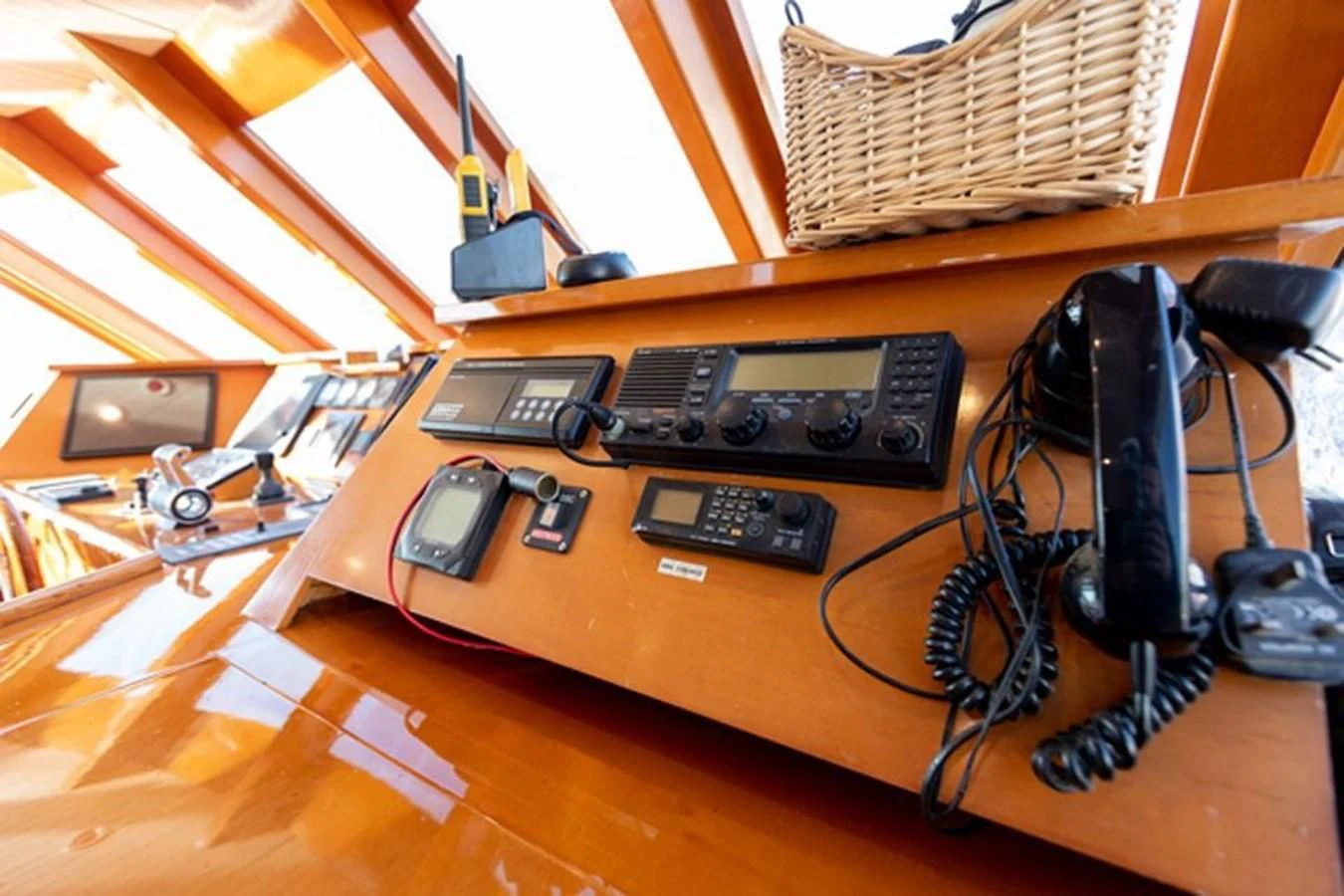 a table with electronics and headphones aboard HISTORY Yacht for Sale