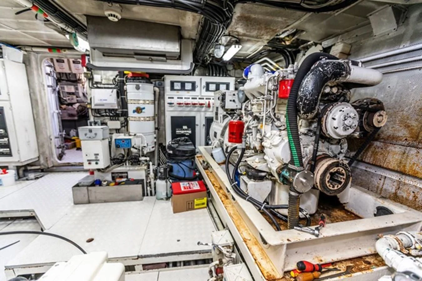 a large room with machinery aboard HISTORY Yacht for Sale