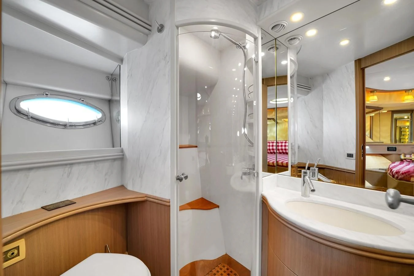 a bathroom with a glass shower aboard PERSHING 88/07 Yacht for Sale