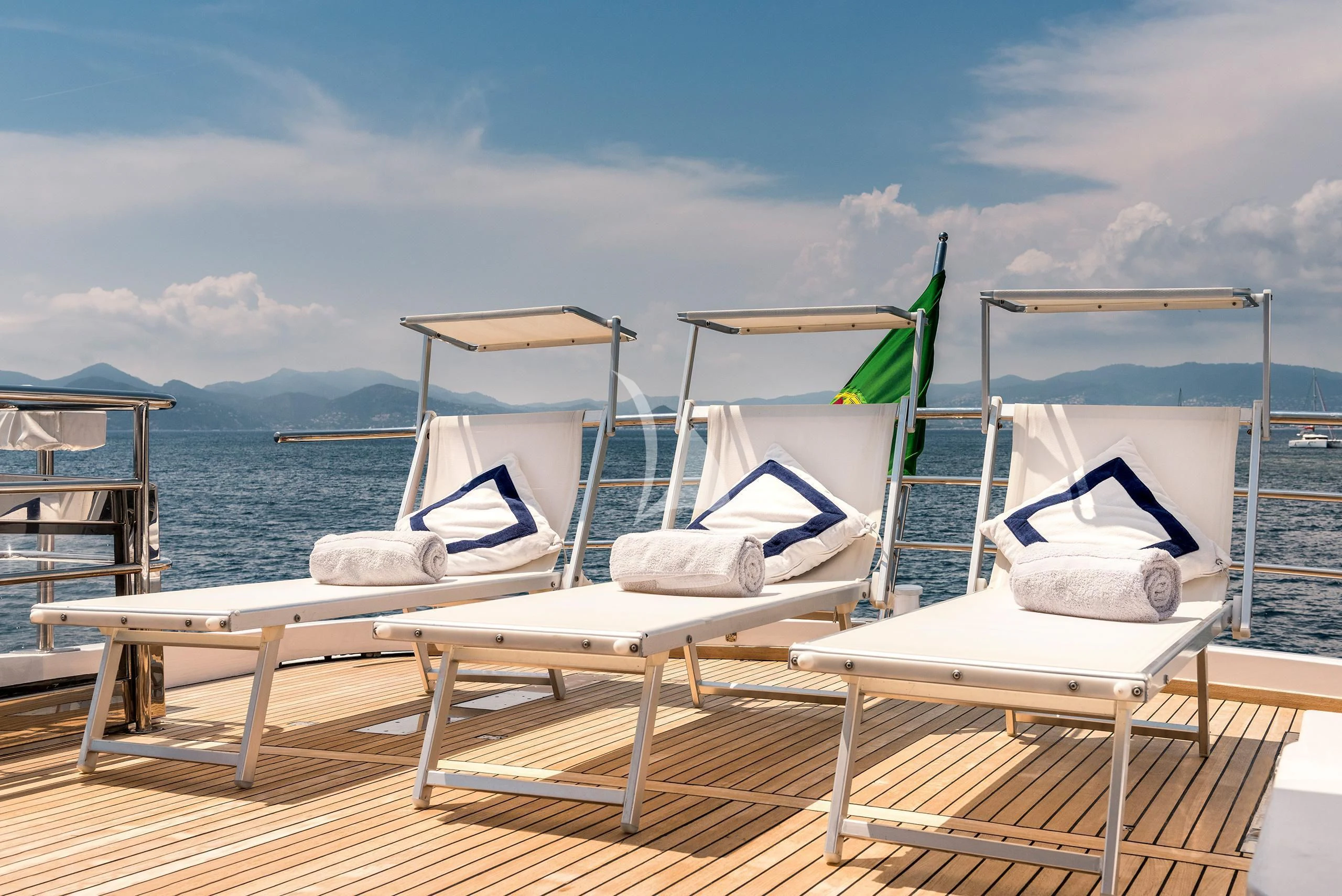 a row of white boats on a dock aboard ANTISAN Yacht for Charter